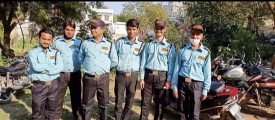 Day Night Security team wearing light blue uniforms